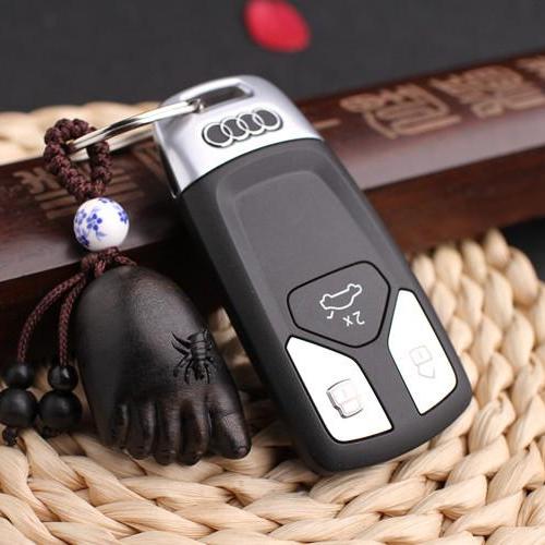 Móc Khóa Gỗ Đen Khắc Thủ Công Hình Bàn Chân Phật