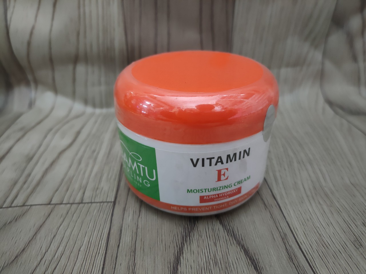 Kem massage mặt cẩm tú vitamin E hũ cam