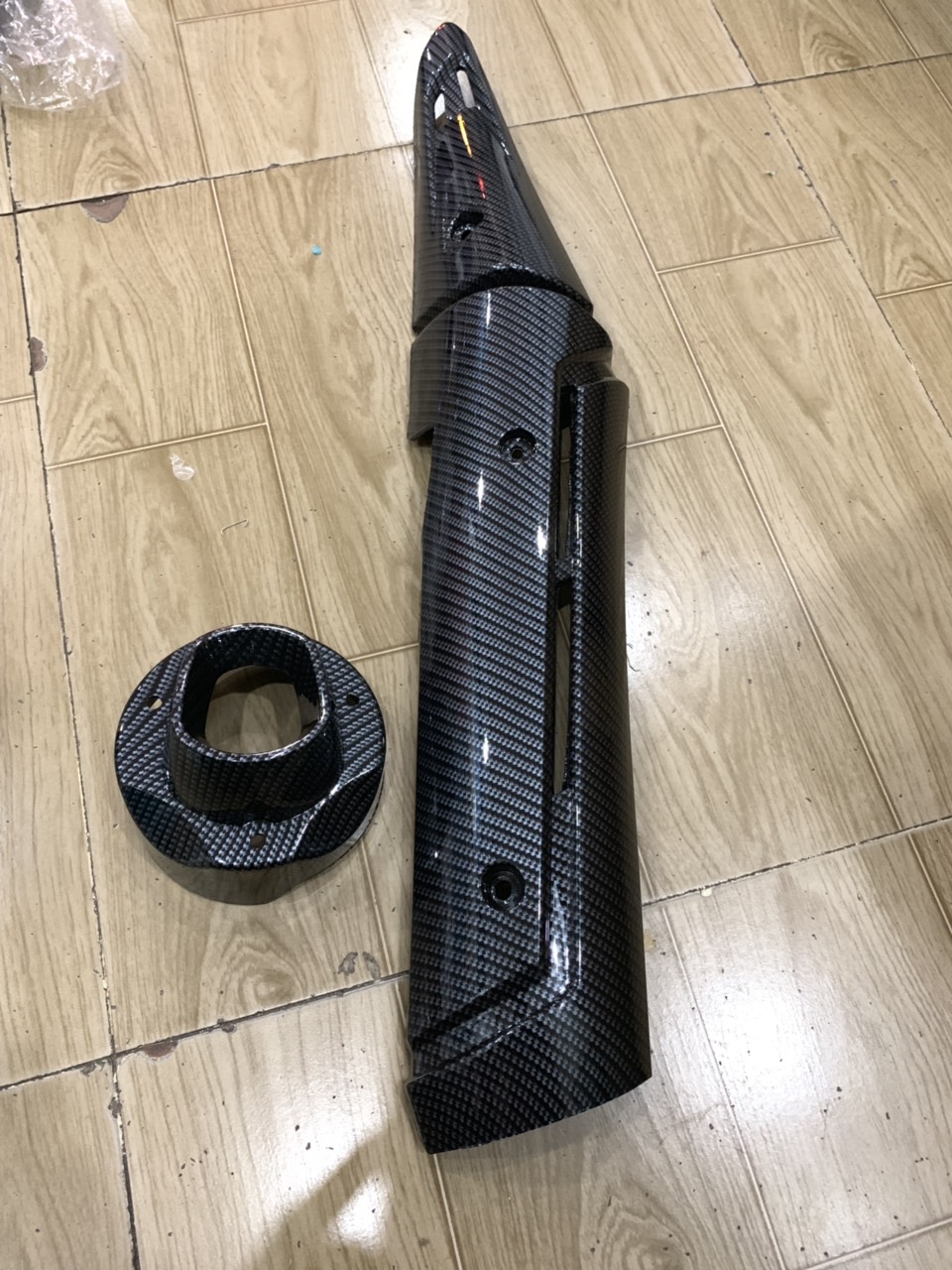 Ốp pô và chụp đích pô xe exciter 150 mẫu TFX màu cac bon