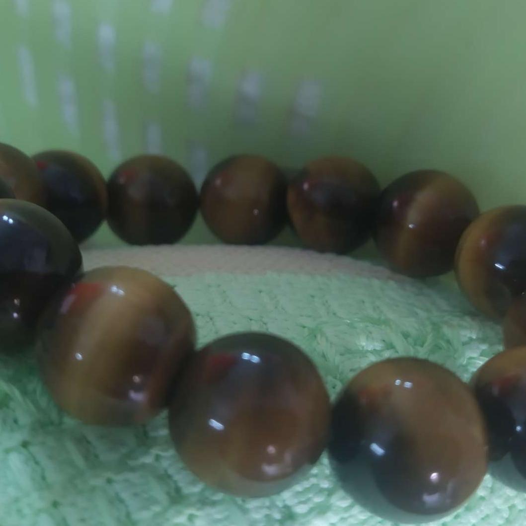 vòng tay  phong thủy đá mắt hổ 14li đá thật