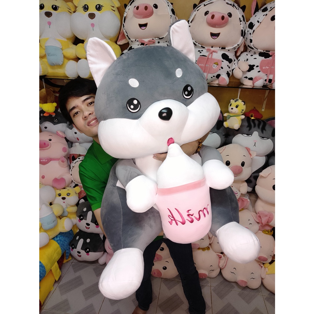 Chó Ôm Bình Sữa gấu bông husky mềm mịn