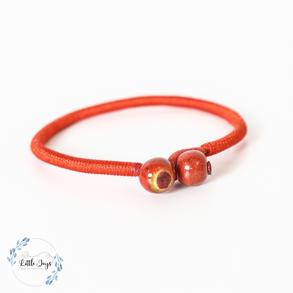 Vòng Tay Chỉ Đỏ Phối Gốm May Mắn giá rẻ