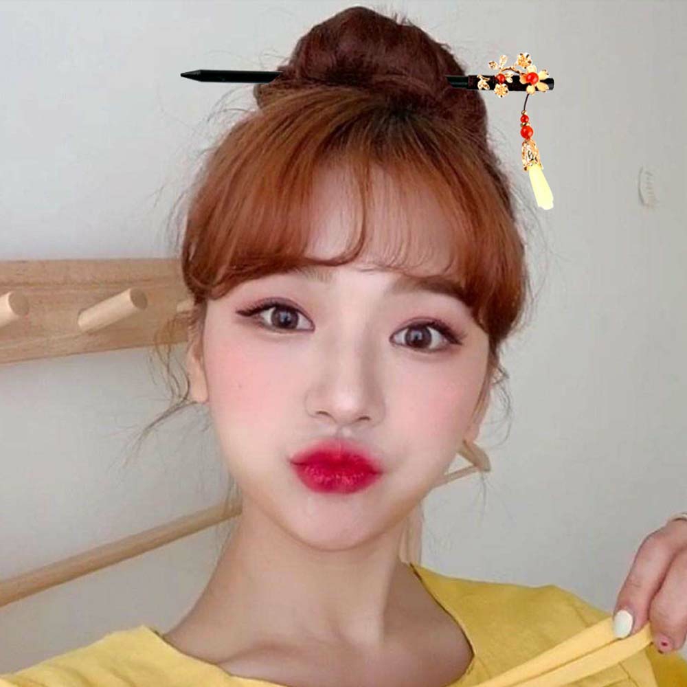 TRÂM BÚI TÓC CỔ PHONG GỖ MIX ĐÁ