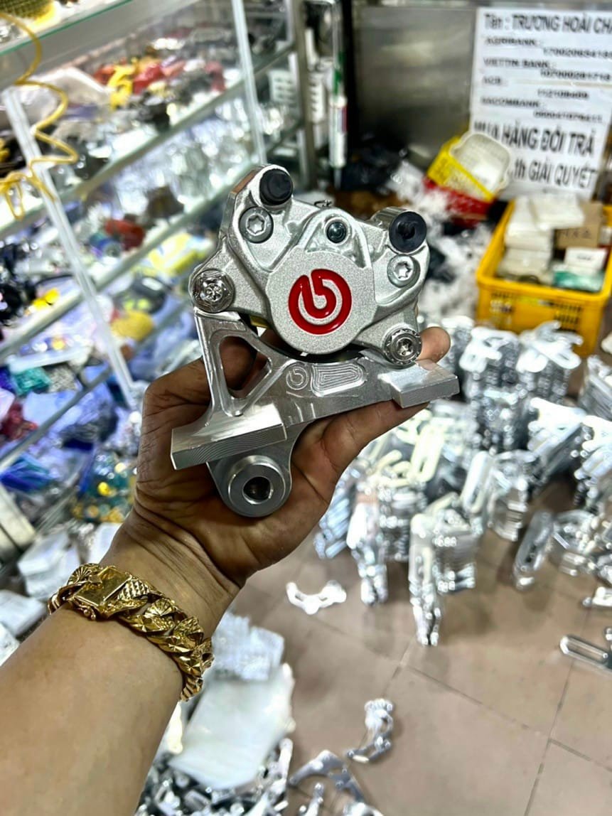 Pát sau ex155/150/135 45 độ đĩa 220mm xài heo 2 piston đối xứng