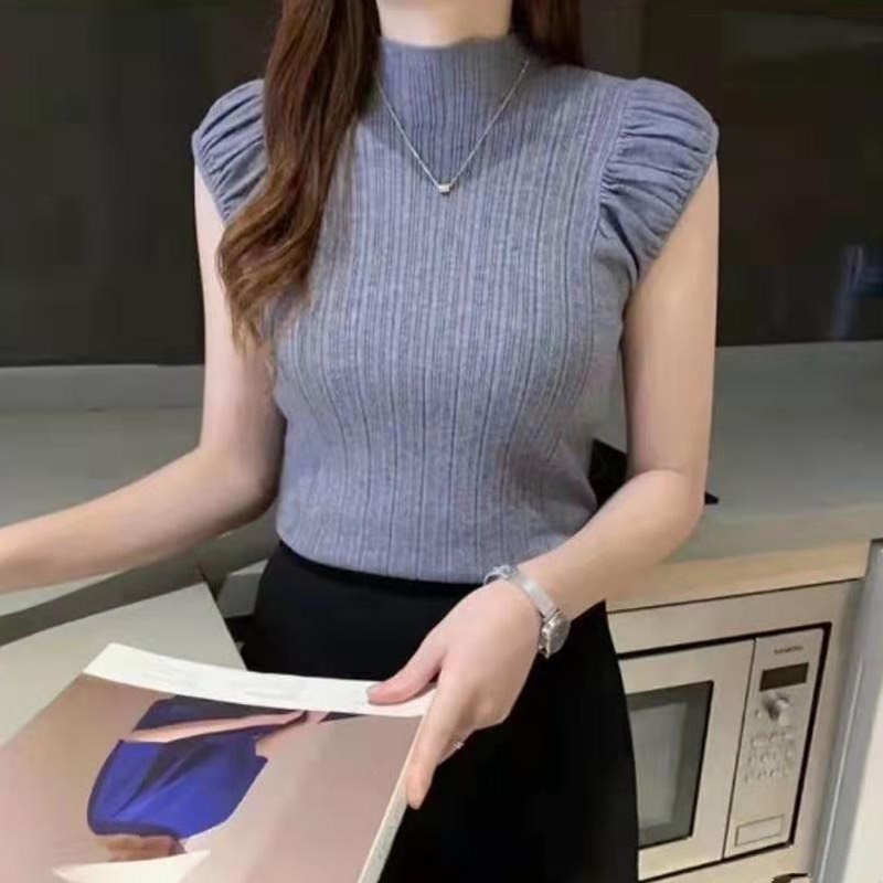 Áo len cổ cao sát nách
