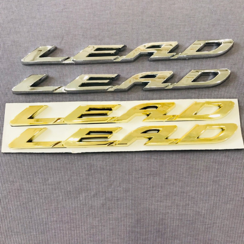 Cặp tem logo xi bóng chữ Lead màu vàng