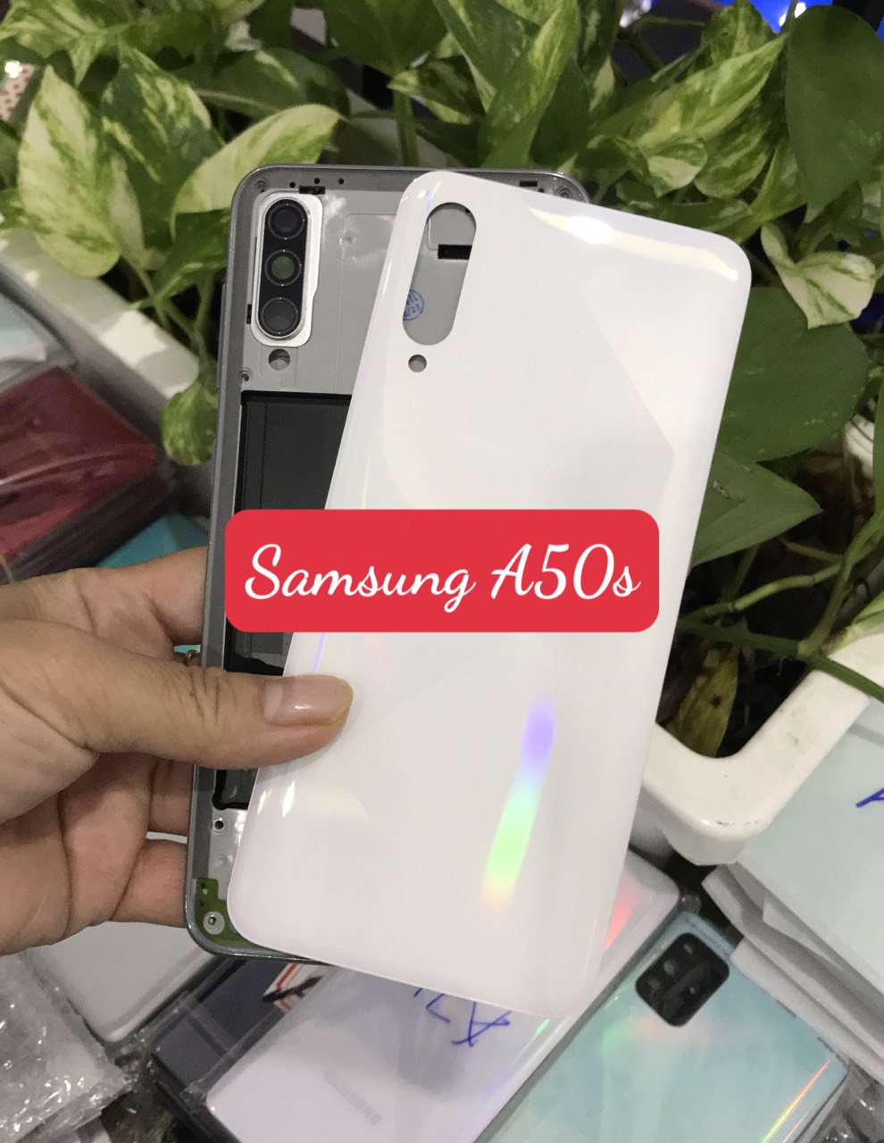Bộ vỏ samsung A50s zin (bộ gồm lưng, sườn ,nút bấm, kính camera)