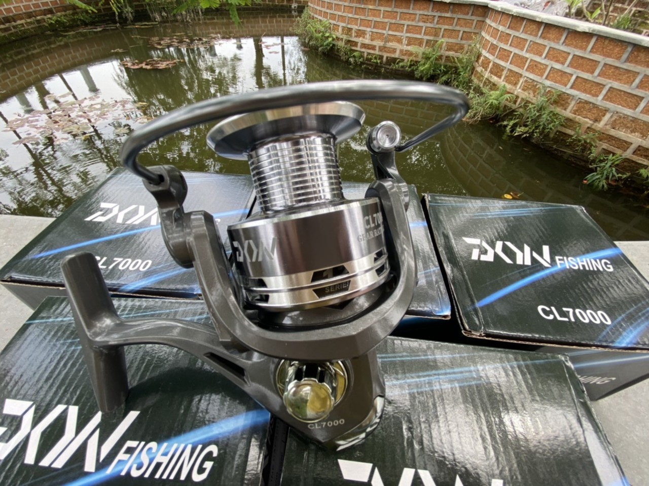 Máy câu cá Yumoshi AL 4000, 5000, 6000, 7000  12 bạc đạn ( đồ câu cá Giang Nam )