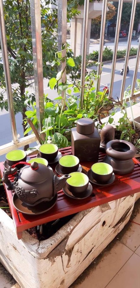 Bộ ấm chén tử sa đắp nổi tuyết tùng