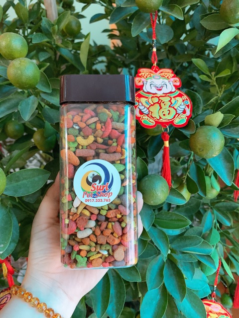 [HCM]Hạt trái cây dành cho vẹt tập ăn hũ 300g