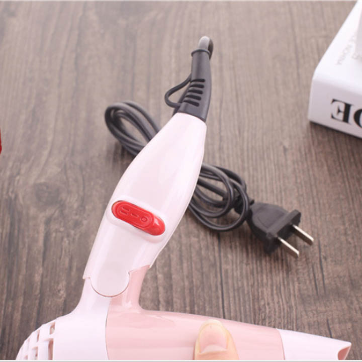 Máy sấy tóc mini gấp gọn tiện dụng