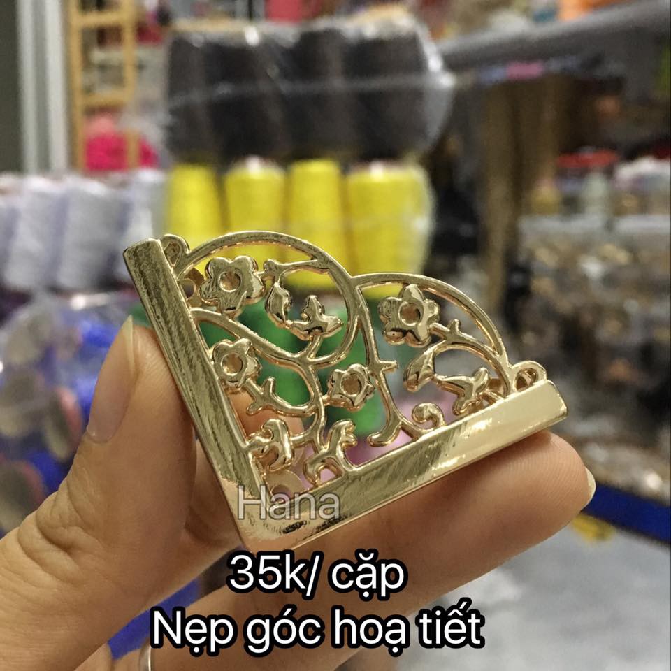 nẹp góc họa tiết gắn túi xách (35k/cặp)