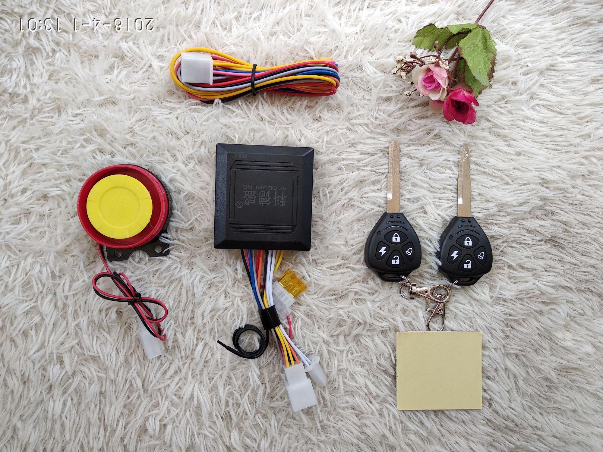 Khóa chống trộm xe máy 4 nút 2 remote liền chìa TA-04