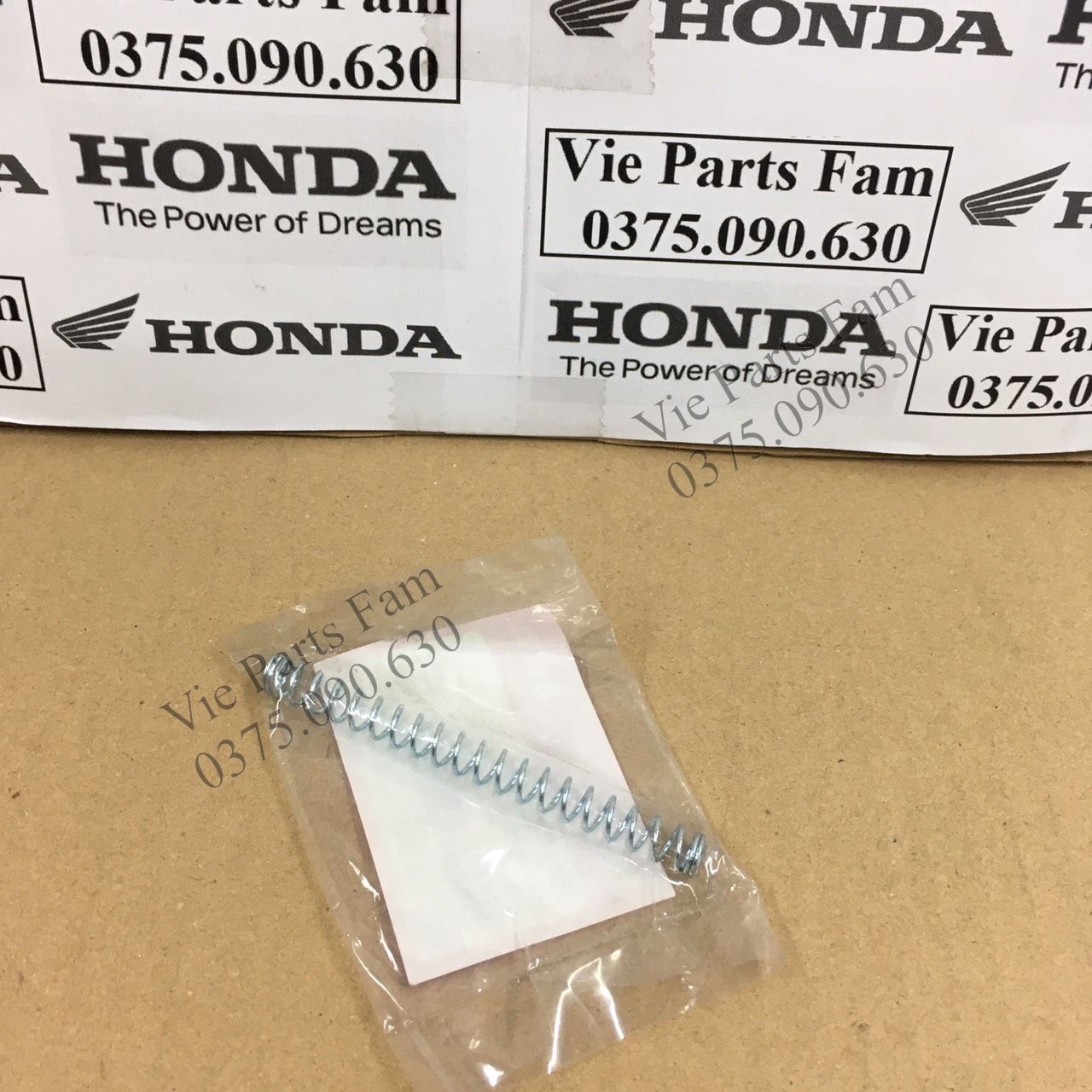 Lò xo đũa phanh Honda