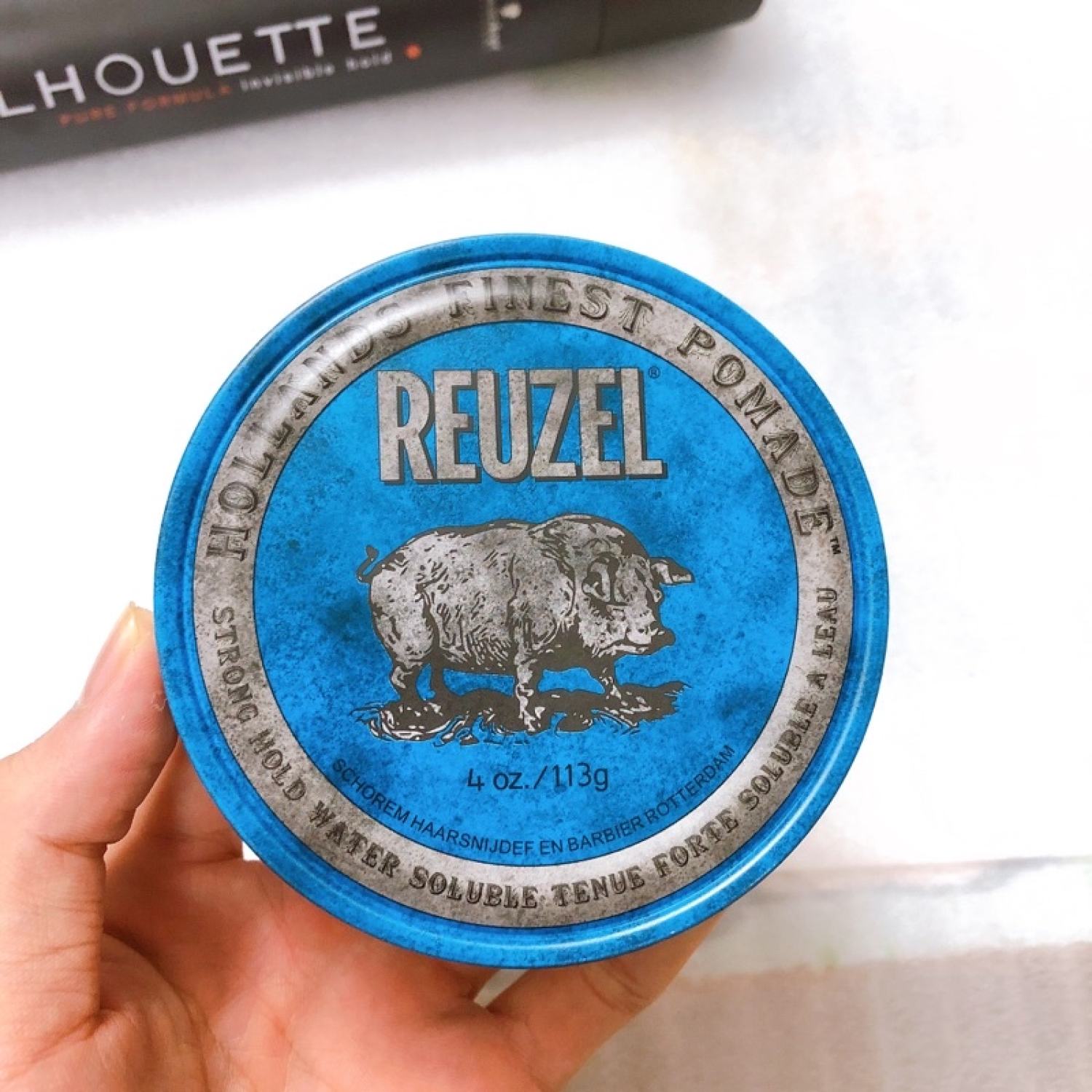 Sáp vuốt tóc con lợn/con heo hương dừa Reuzel Blue Pomade