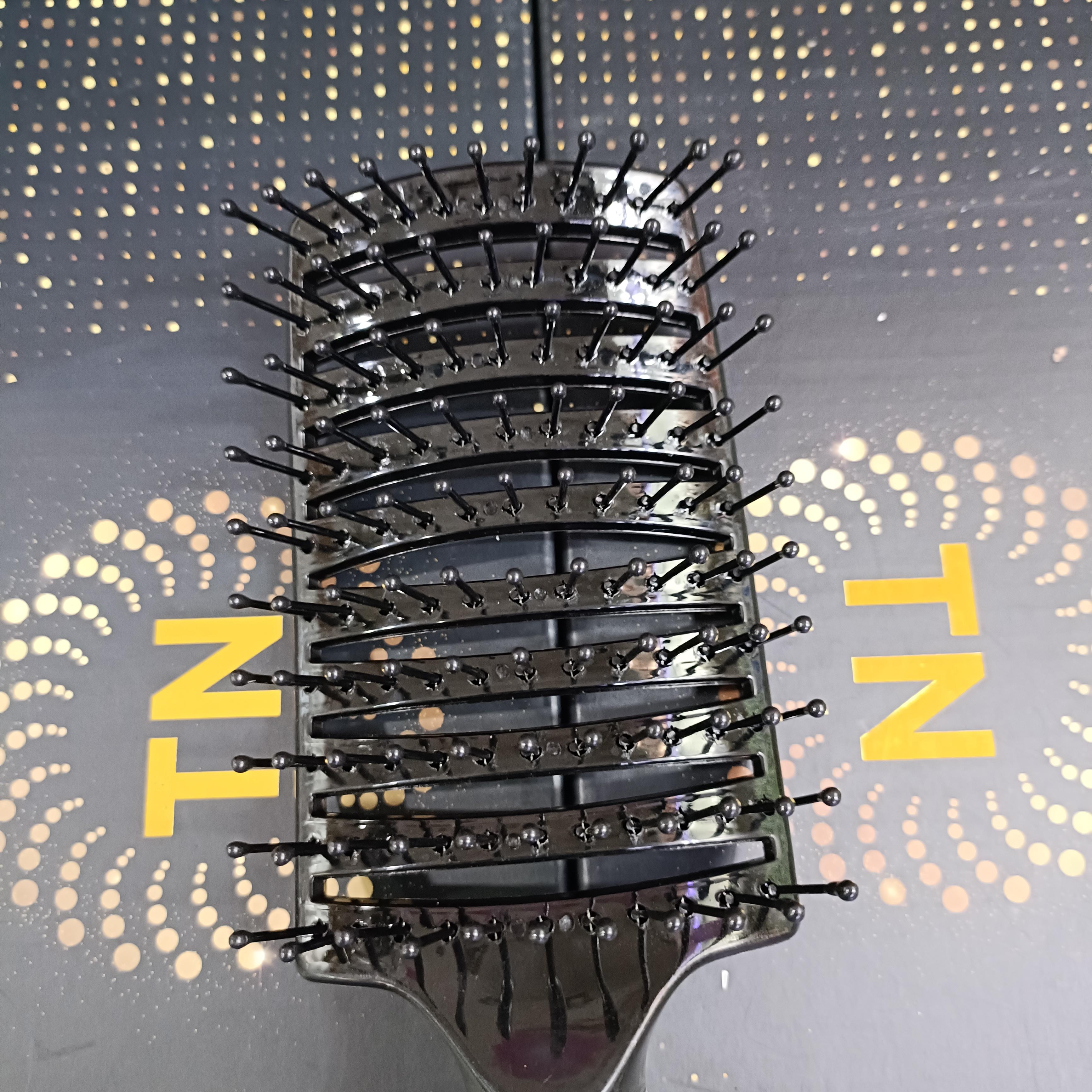 Lược gỡ rối tóc bán nguyệt.