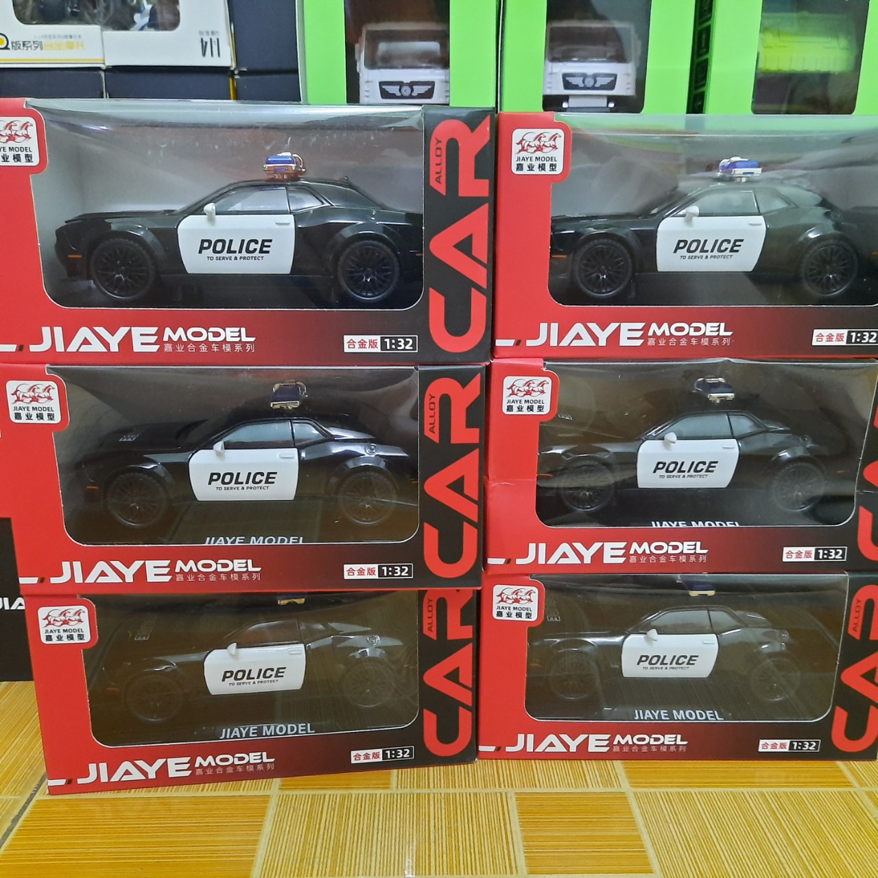 Đồ chơi trẻ em xe ô tô cảnh sát Challenger bằng sắt có đèn và âm thanh tỉ lệ 1:32 xe đồ chơi trẻ em