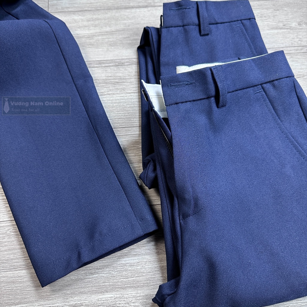 Quần tây học sinh nam lưng nẹp màu xanh đen cấp 1 2 chất polyster