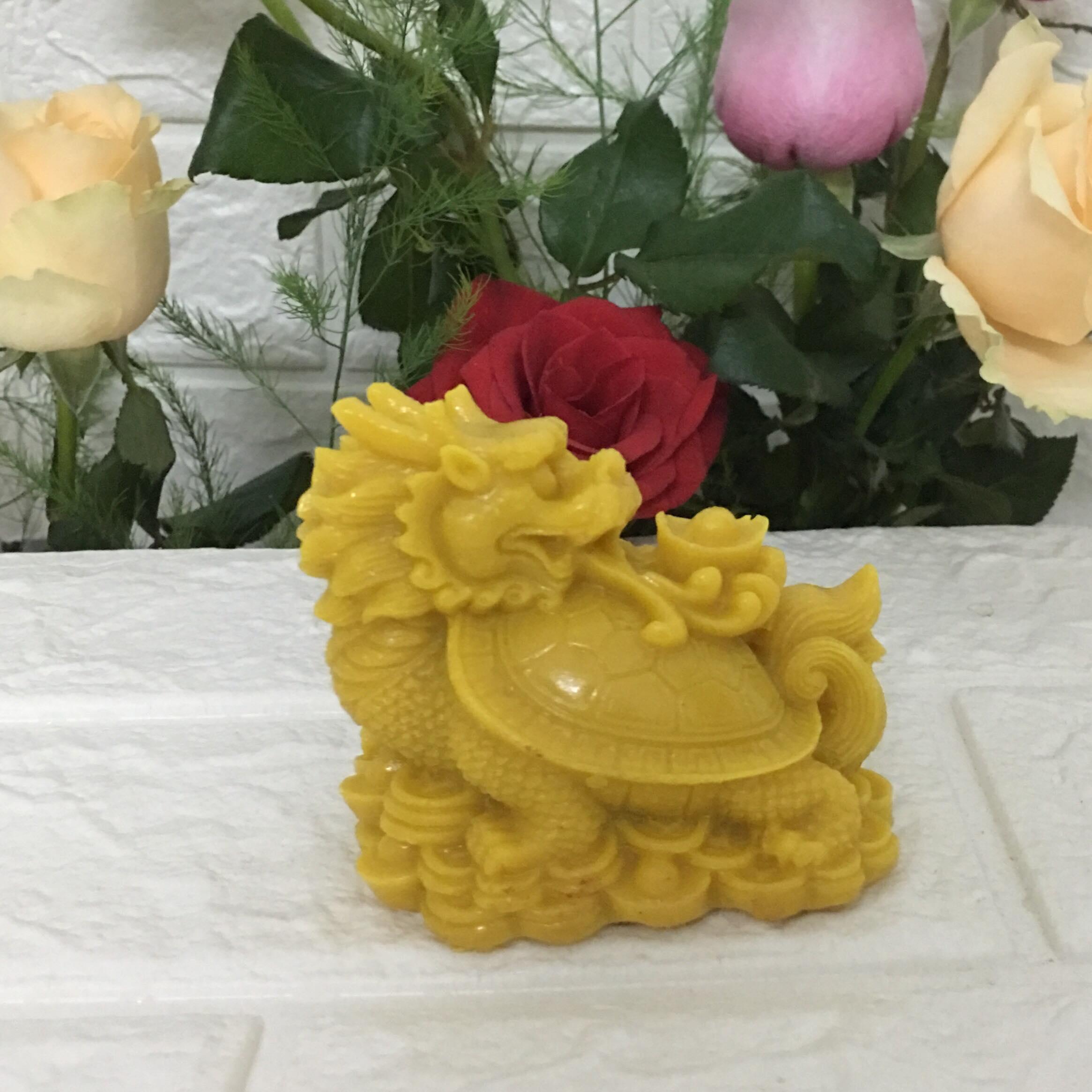 Tượng long quy mang thỏi vàng tài lộc