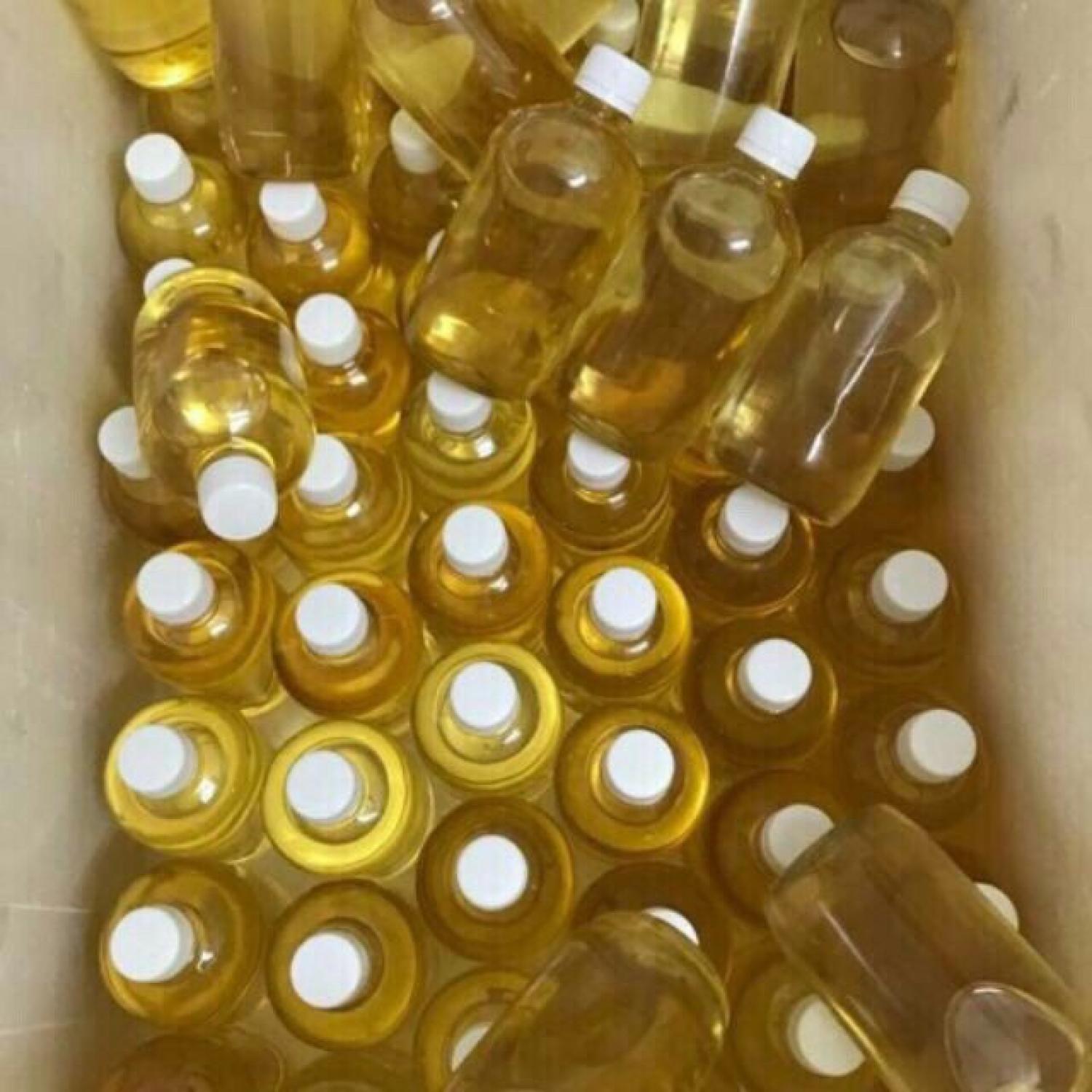 1 Liter of 2 Bottles of Fragrant, Handcrafted Coconut Oil.