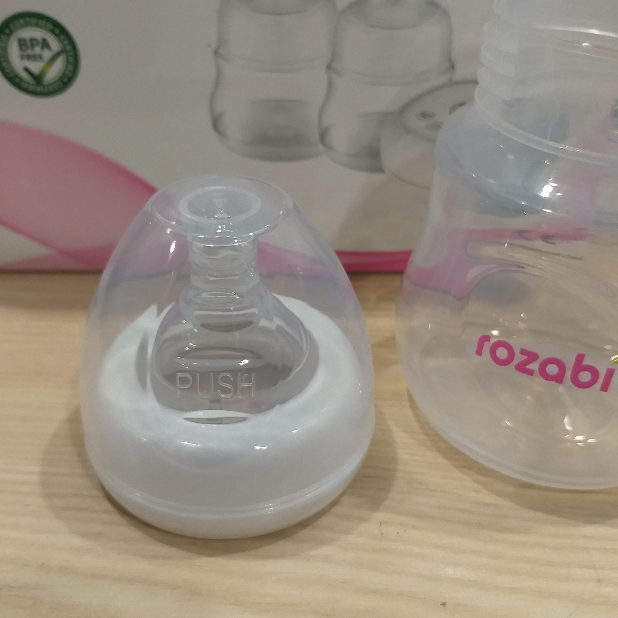 Núm ti máy hút sữa rozabi basic