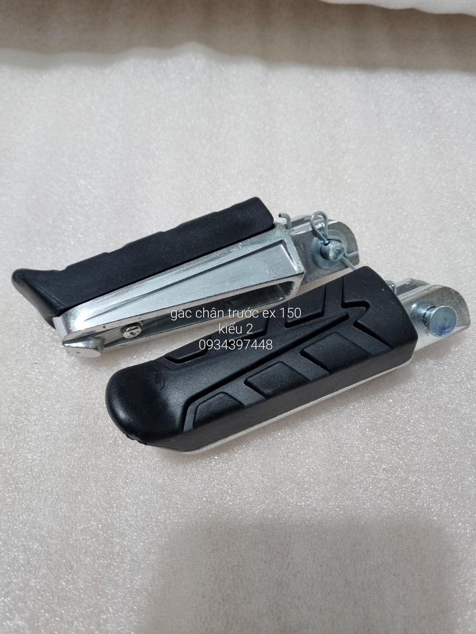 GÁC CHÂN TRƯỚC EX 150 SẮT