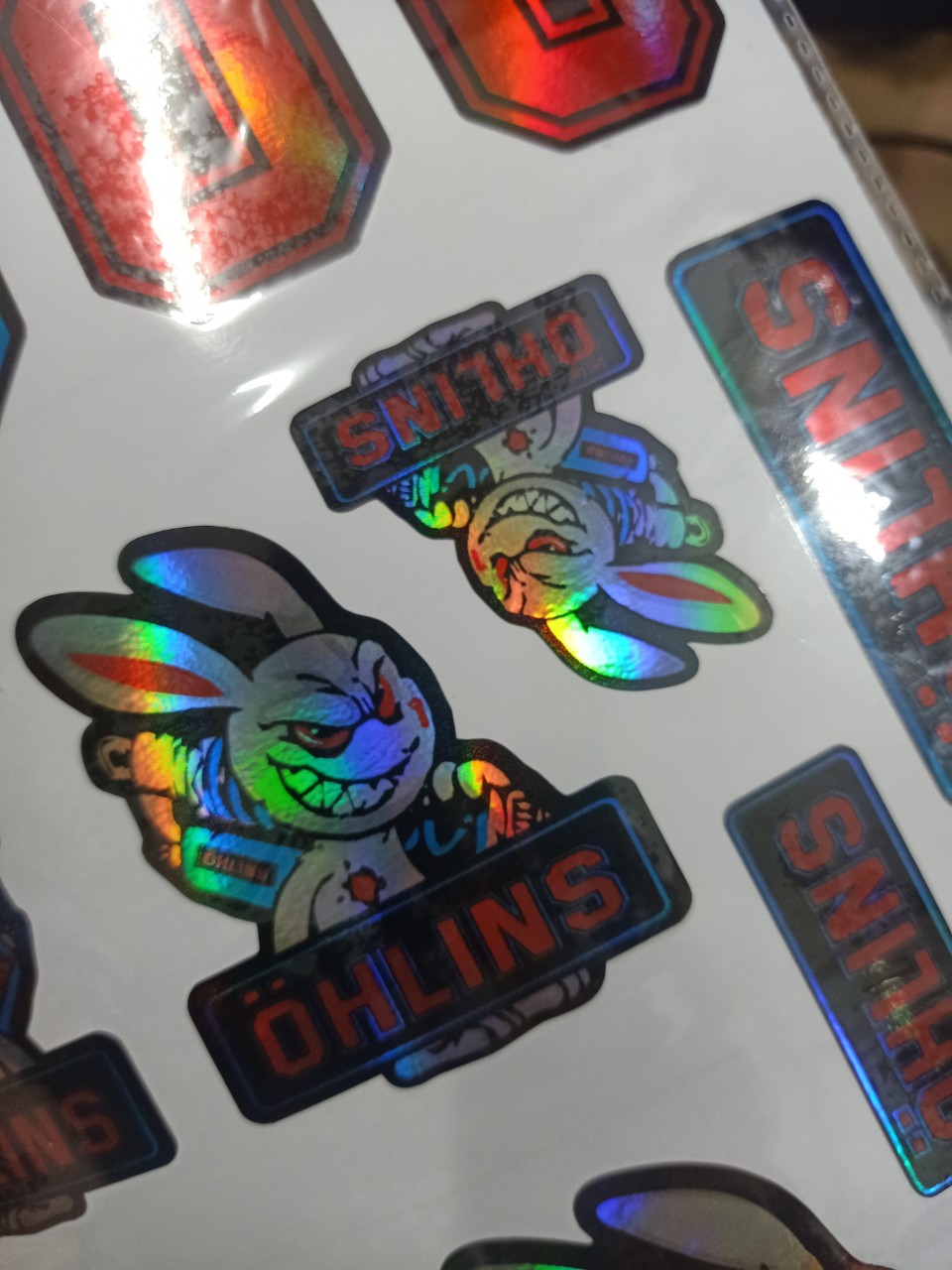 Tem Dán Xe Máy Logo Crom Con Thỏ Cầm Phuộc