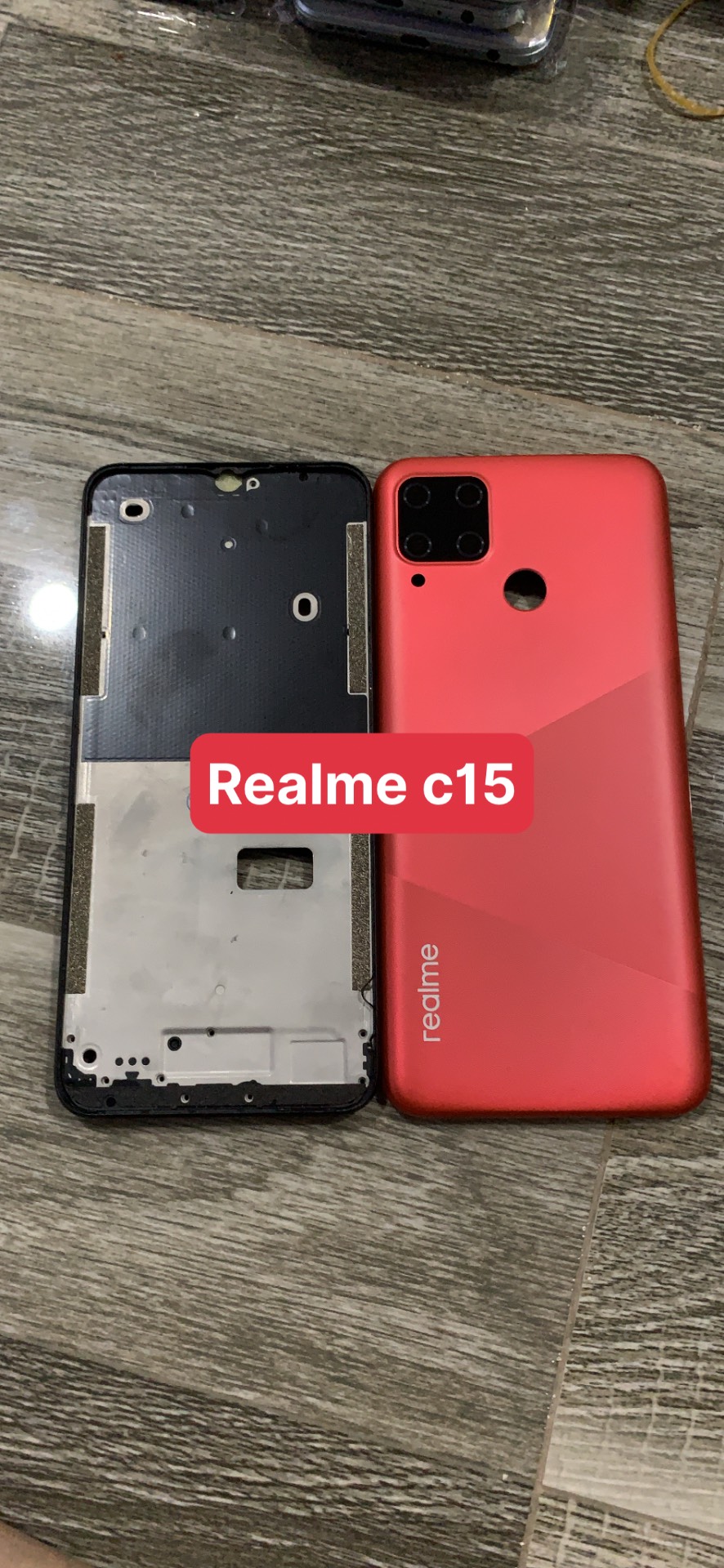 bộ vỏ realme C15 ( gồn, sườn, lưng,nút bấn,kính cam )zin