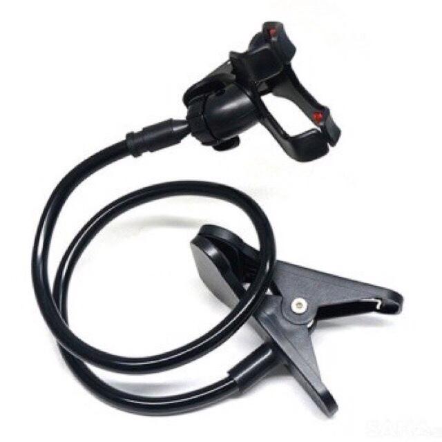 It is 1 pack. Multifunctional clamp for phone, bracket, 360 degree rotating monkey tail clip. 000106