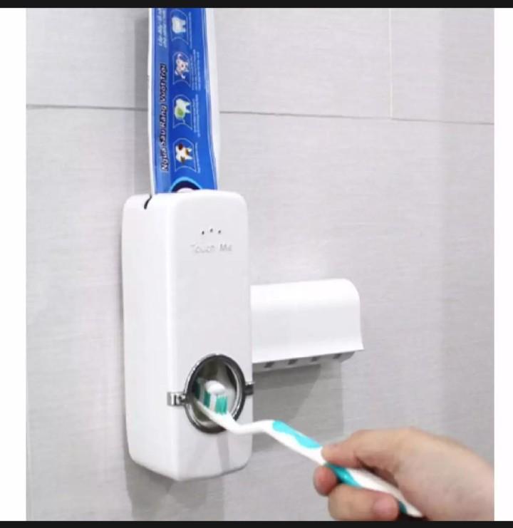nhả kem đánh răng tự động