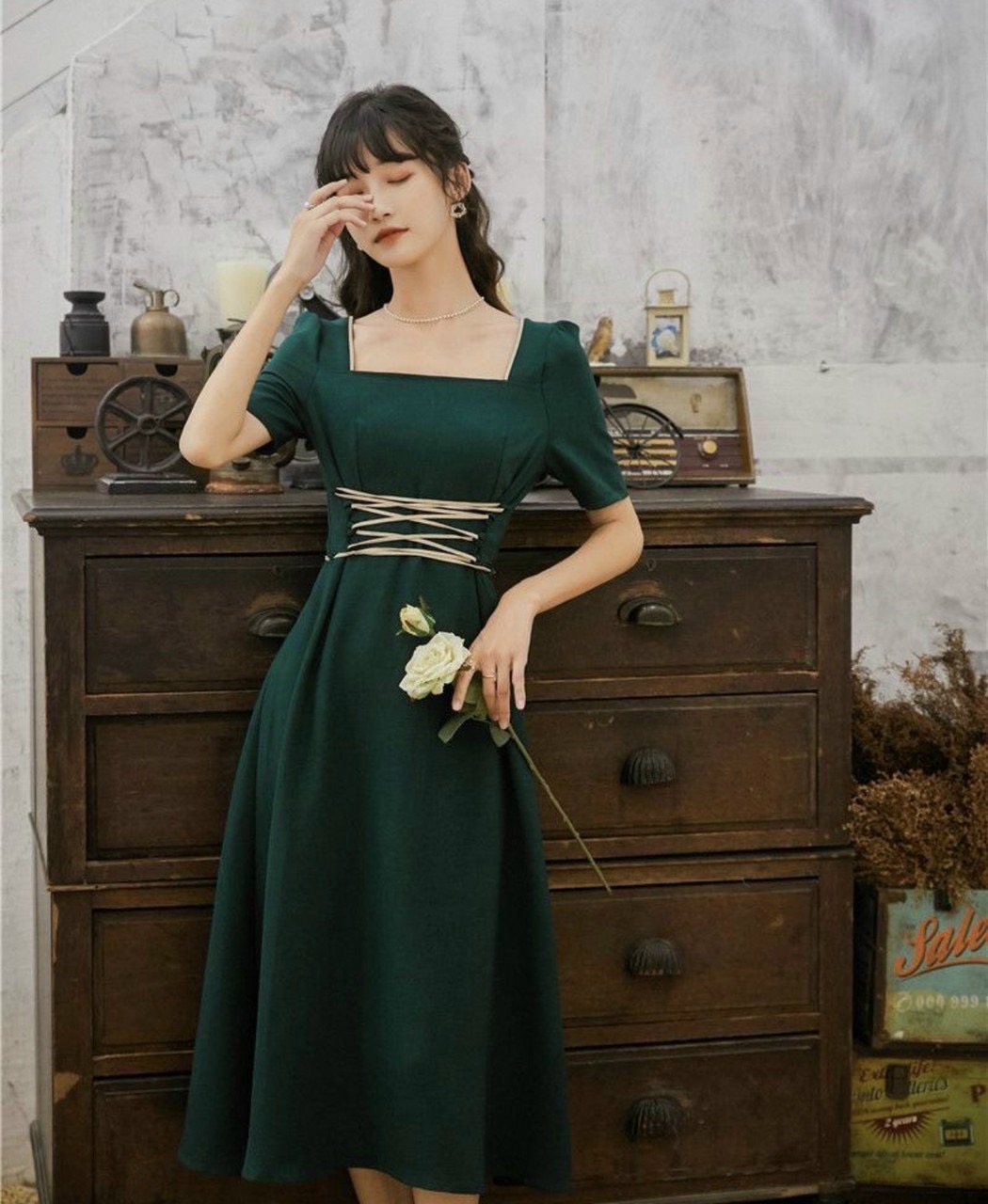 Đầm xanh lính đan dây kem