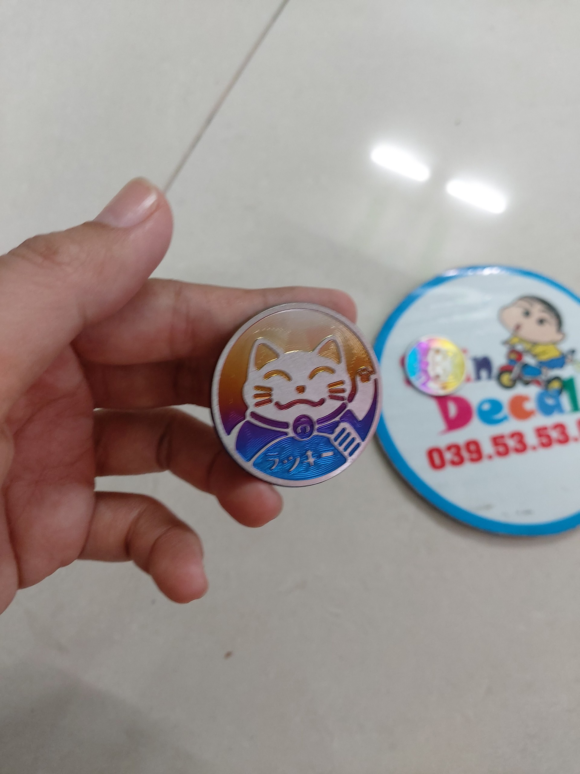 Logo mèo thần tài titan 7 màu