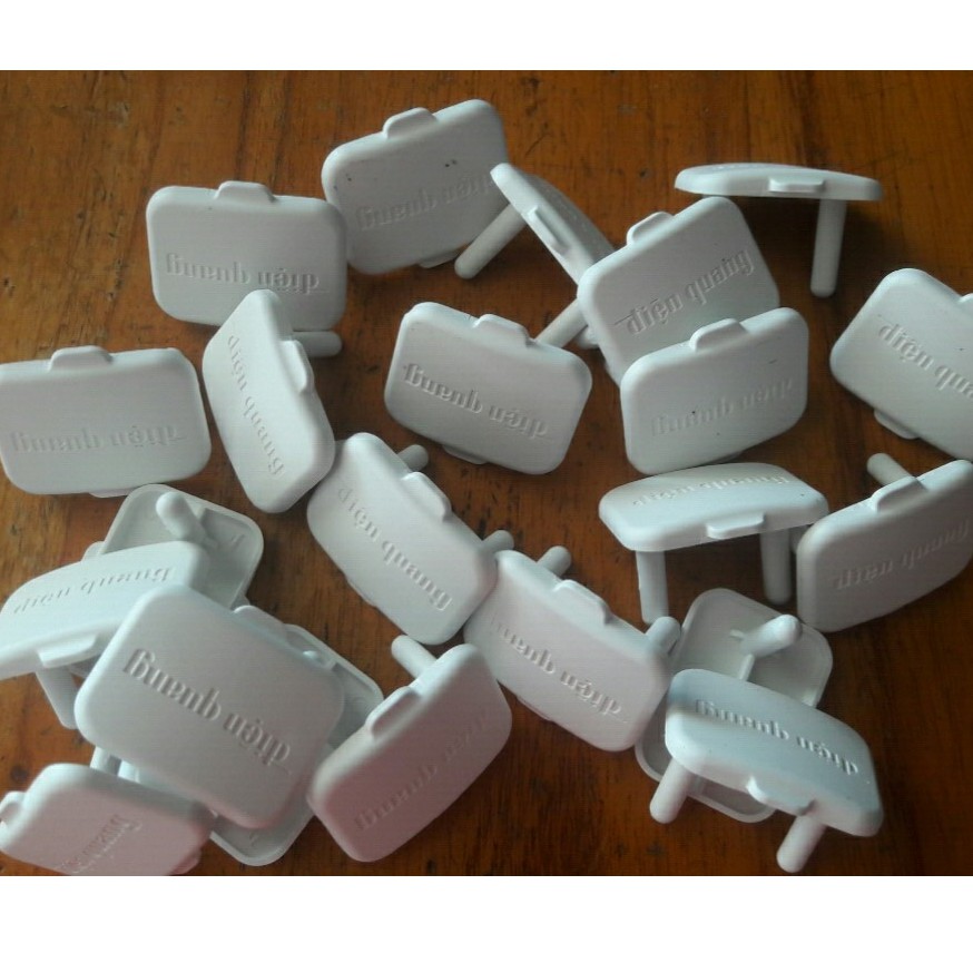 Nút bịt ổ cấm Điện Quang ( nắp che ổ cấm điện ) trắng xanh hồng
