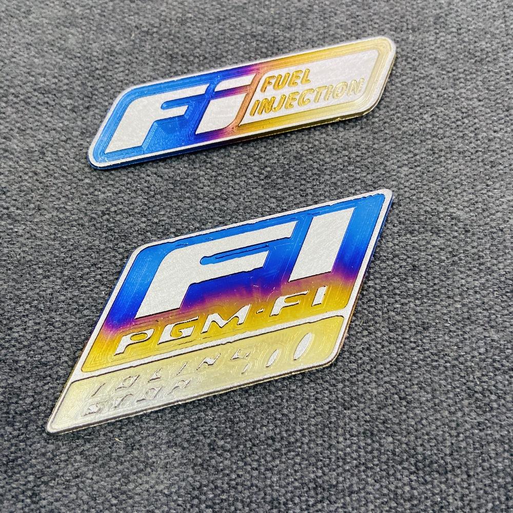 [COMBO TITAN FI] TEM TITAN FI,HUY HIỆU LOGO FI TITAN (100%) TRANG TRÍ DÁN XE SIÊU CHẮC (1 FI DÀI 1 FI NGẮN)