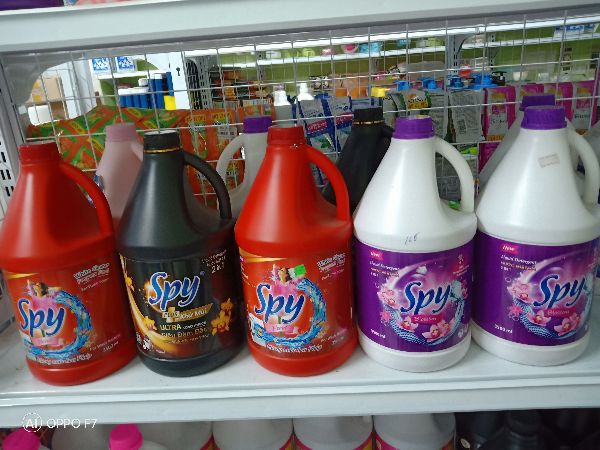 Nước giặt xả spy 4500ml hương hoa pháp can tím. đỏ, xanh