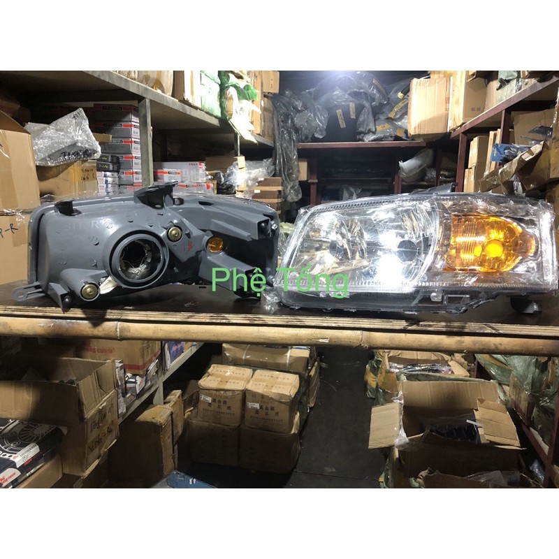 Đèn pha Suzuki carry Pro 750 / Suzuki APV Bên Phụ ( Bên Lơ )