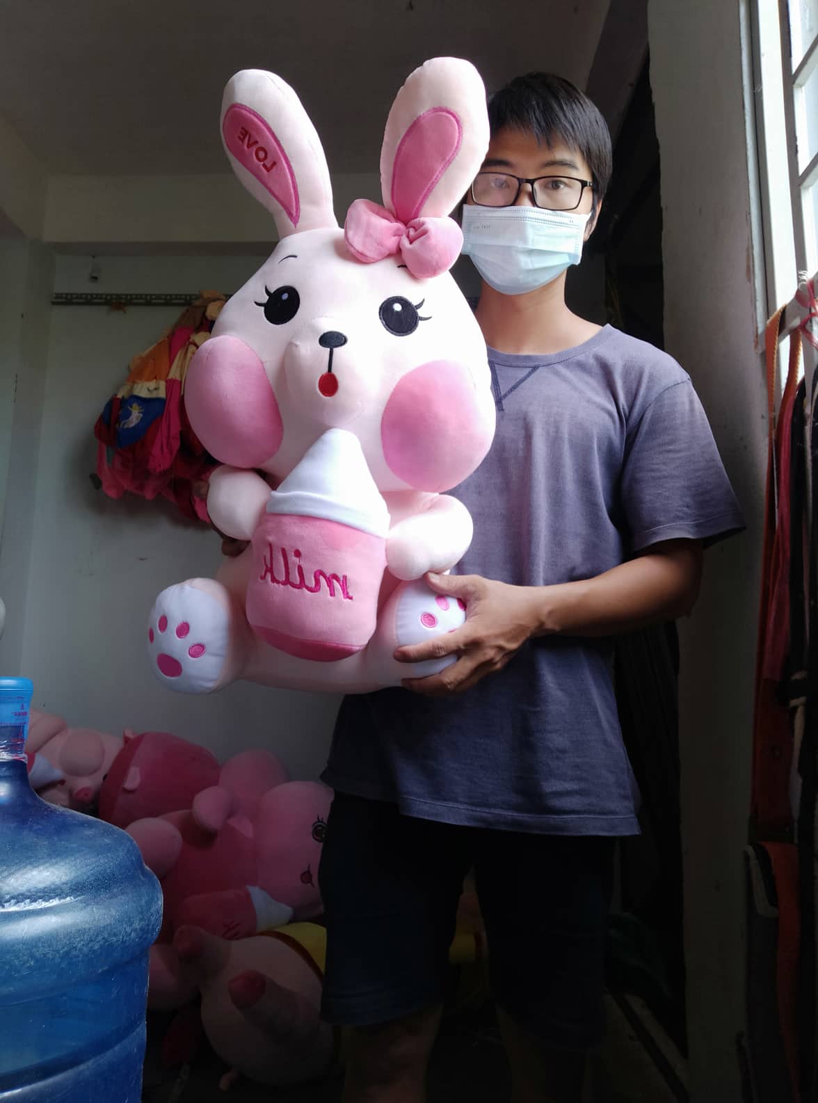 Gấu bông thỏ bông Thỏ ôm bình sữa