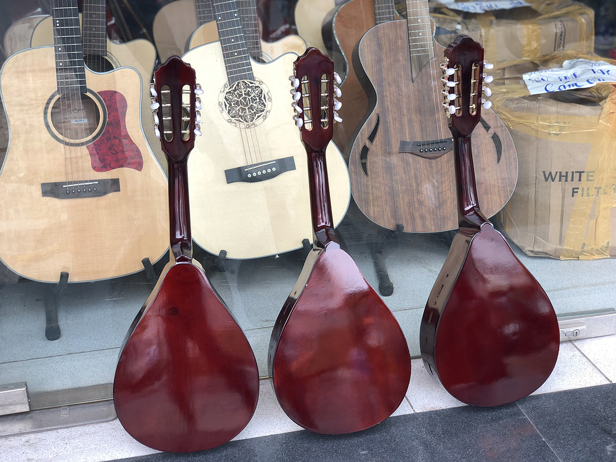 Đàn mandolin gỗ ép mặt thông
