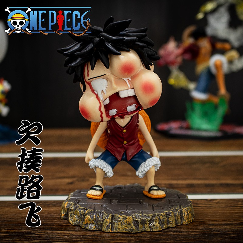 mô hình luffy bị đánh sưng mặt