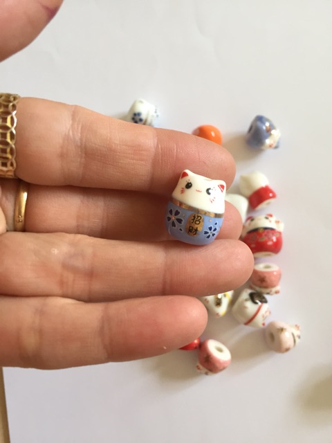 Mèo gốm thần tài đủ màu