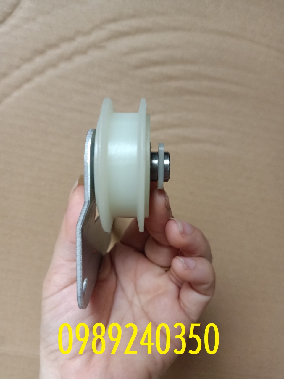 Bánh tỳ căng dây curoa máy sấy Whirlpool