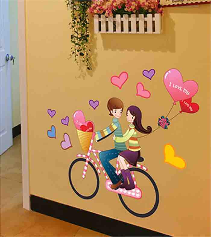 Decal tranh dán tường đôi bạn đạp xe