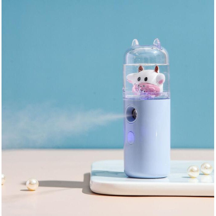 Máy phun sương mini cầm tay hình bò sữa