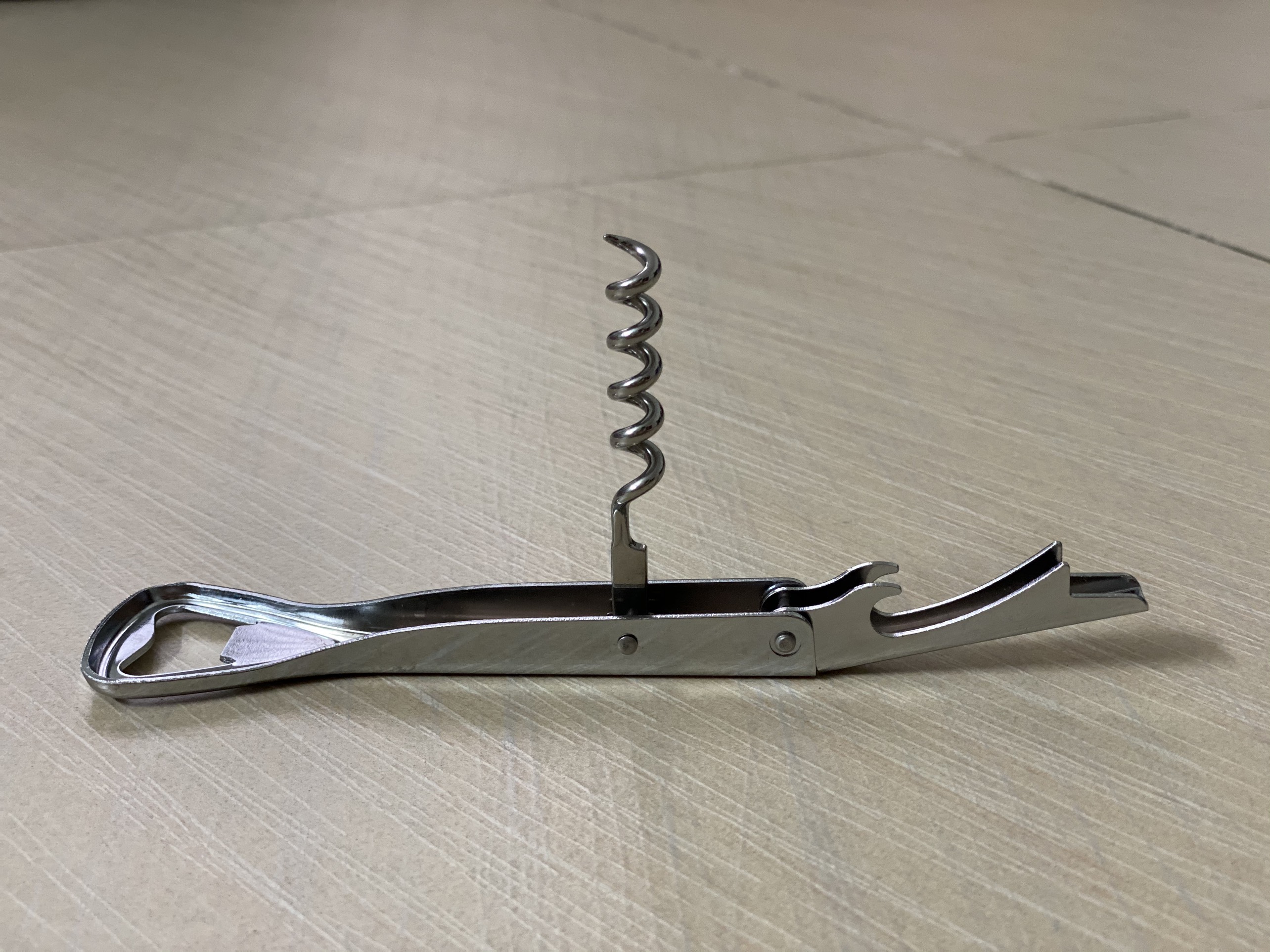 Bottle cap opener opening tool
