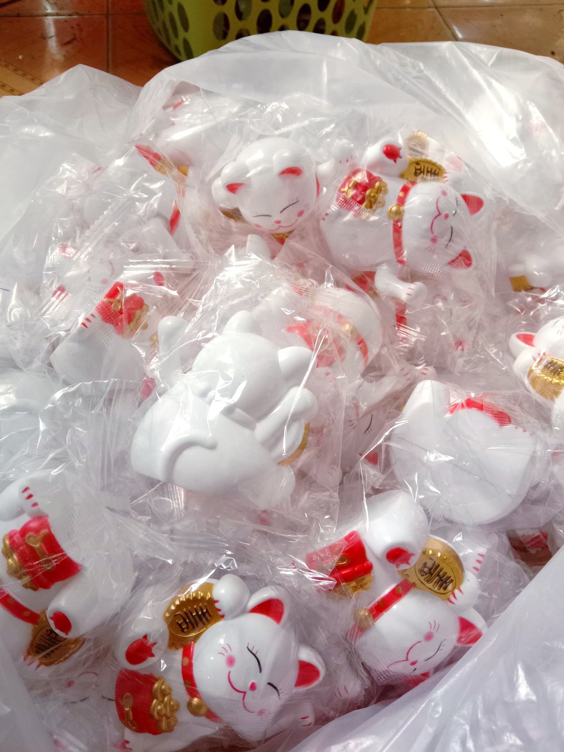 mèo may mắn, thần tài