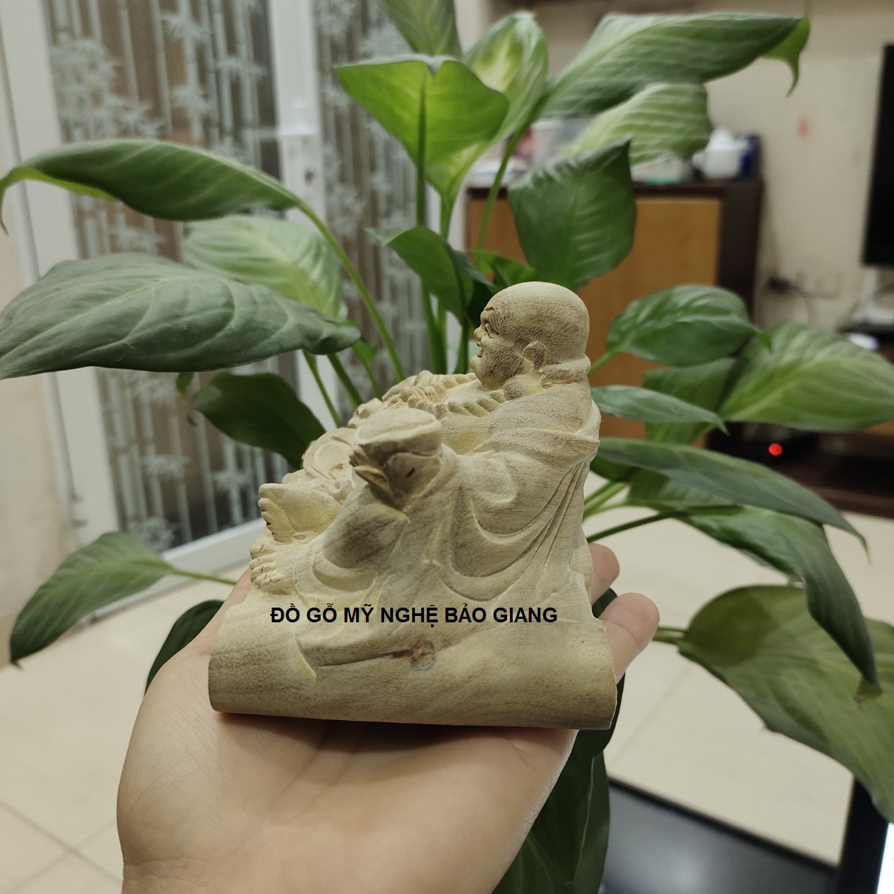 Tượng phật di lặc gỗ xá xị để mộc thơm phức