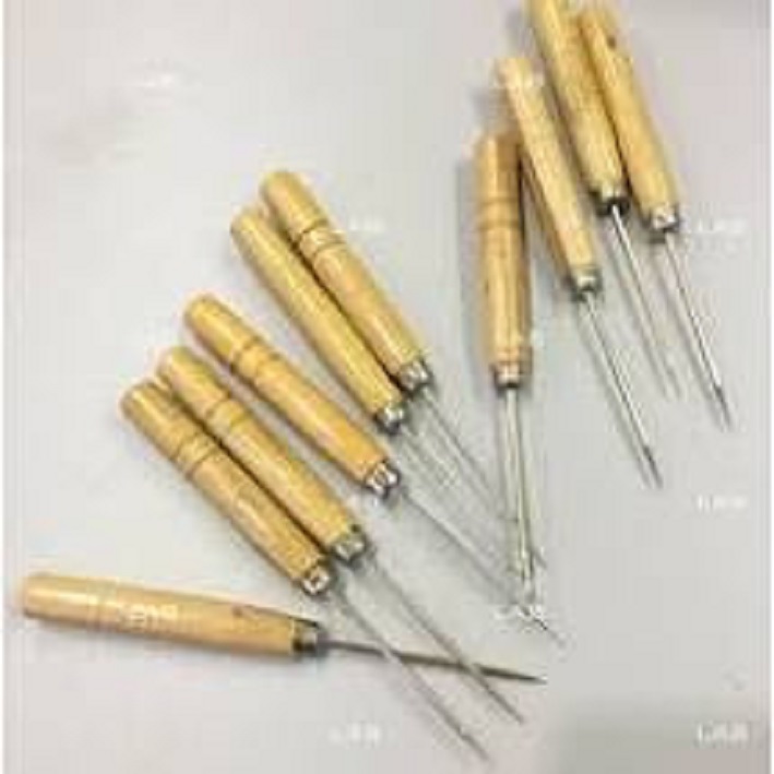 Dùi lỗ vải đóng cúc làm hoa lụa