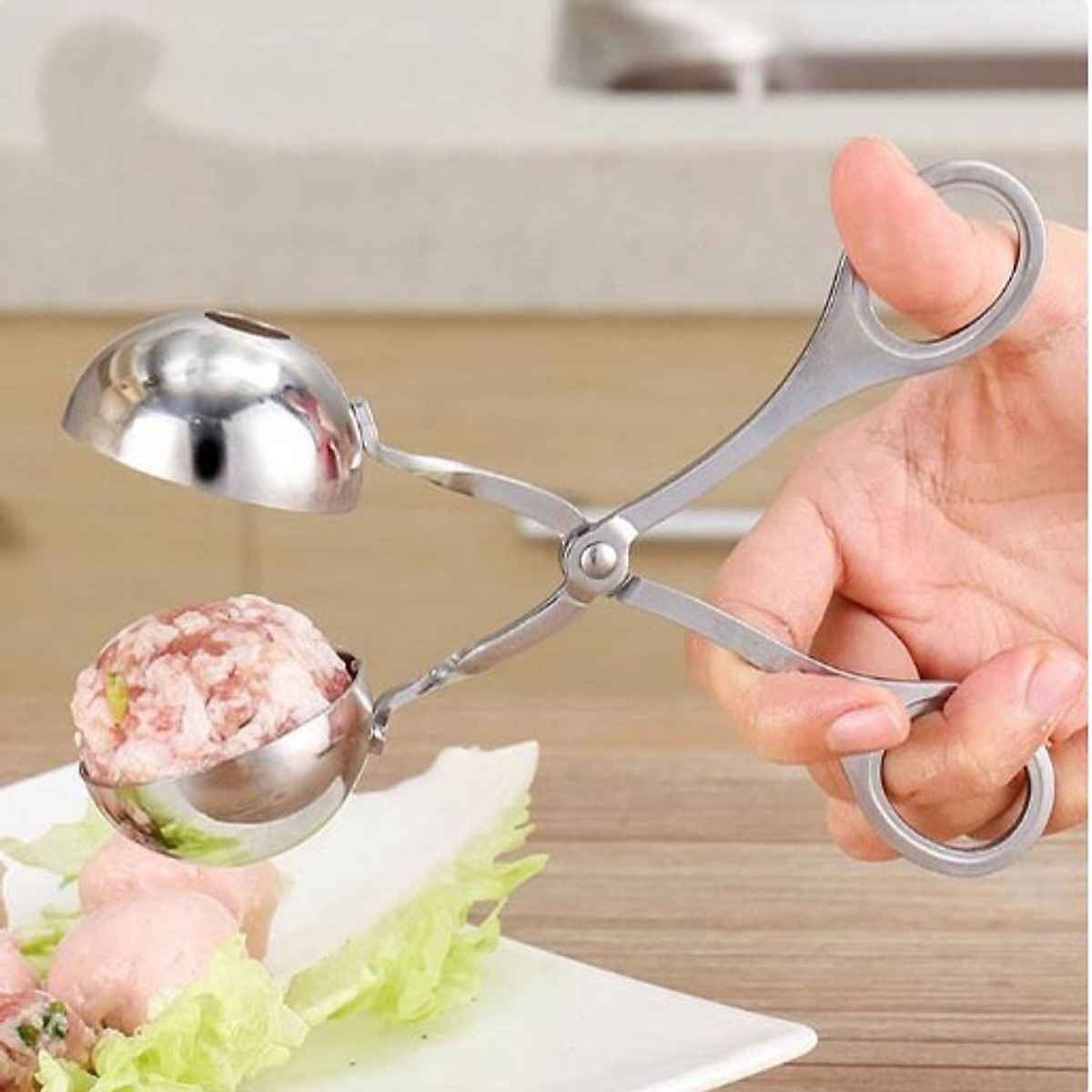 Dụng cụ kẹp thịt viên, chả viên inox