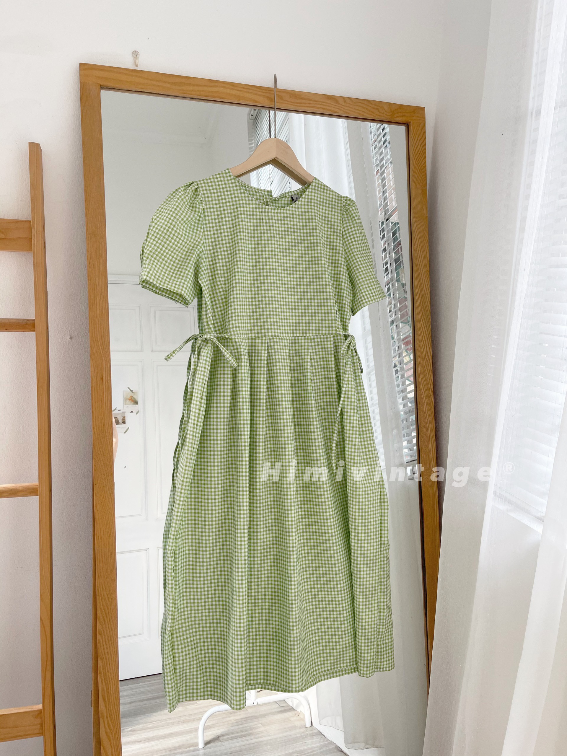 Đầm caro babydoll dây thắt nơ eo