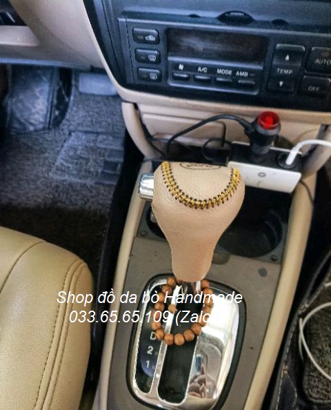 Bao da bọc cần số xe Ford laser số tự động bằng da bò 100%